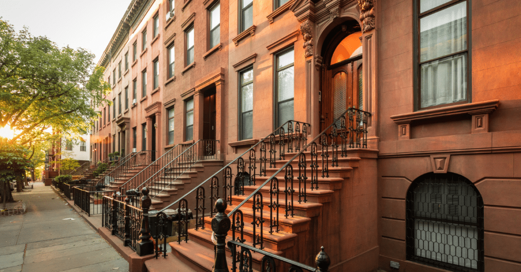 Which improvements on buildings require revocable consent agreements?